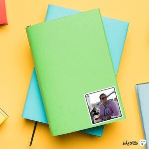 استیکر لپ تاپ لئوناردو دیکاپریو روی دفترچه