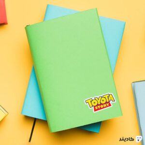 استیکر لپ تاپ شرکت Toyota - داستان‌های تویوتا روی دفترچه